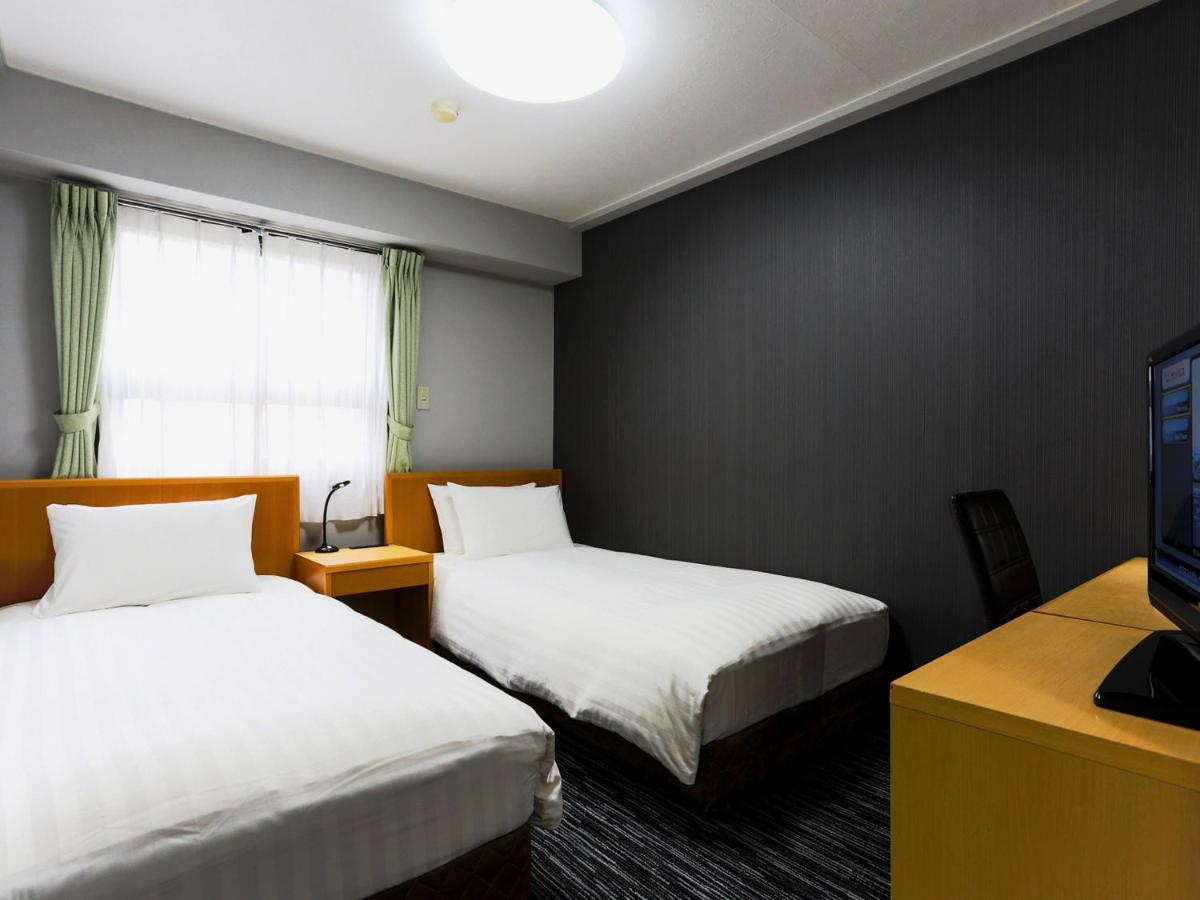 Business Hotel Sunpalace Токио Екстериор снимка