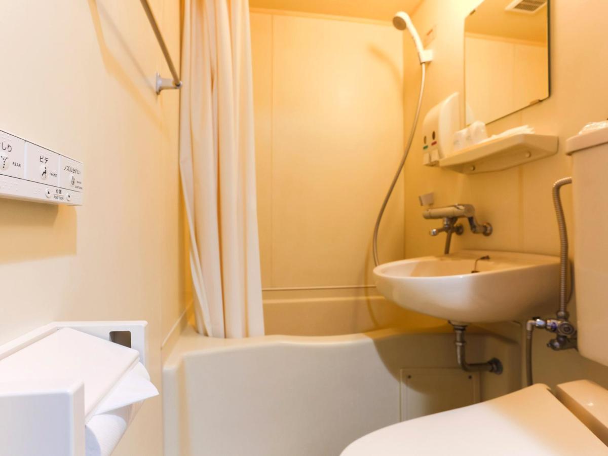 Business Hotel Sunpalace Токио Екстериор снимка