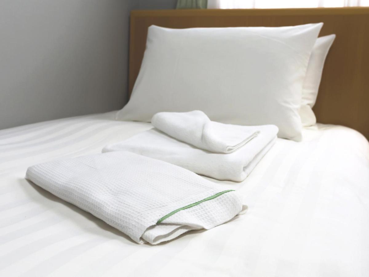 Business Hotel Sunpalace Токио Екстериор снимка
