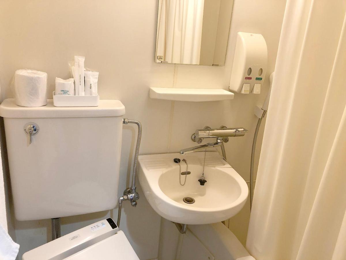 Business Hotel Sunpalace Токио Екстериор снимка